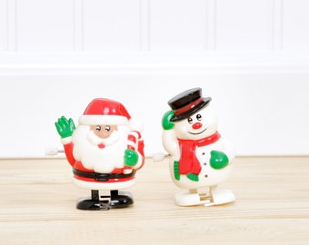 Vintage wind up walking Snowman and Santa