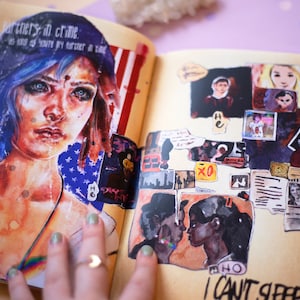 May include: Open journal with watercolor illustrations and collaged images. The left page features a portrait of a person with blue hair and the text "Partners in Crime." The right page has various collaged images and the text "I Can't Sleep."
