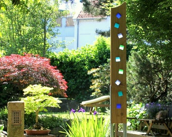 Gartenskulptur aus Holz und Glas. Gartendekoration als Unikate handgemacht und wetterfest.