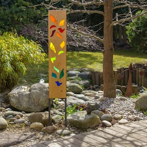 garden sculpture of wood and glass