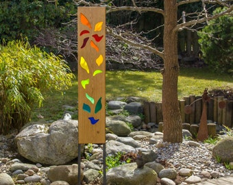 garden sculpture of wood and glass