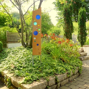 garden sculpture of wood and glass