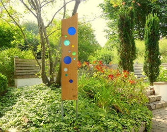 garden sculpture of wood and glass