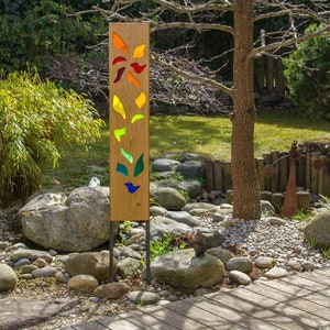 garden sculpture made of wood and glass