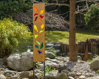 Garden sculpture made of wood and glass