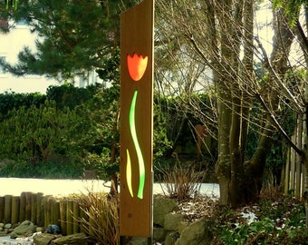 garden sculpture of wood and glass