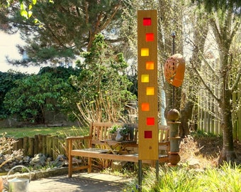 Gartenskulptur aus Holz und Glas. Gartendekoration als Unikate handgemacht und wetterfest.