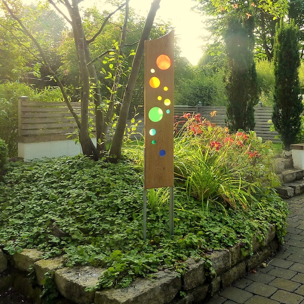 garden sculpture of wood and glass