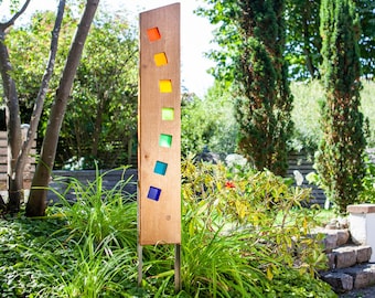 Gartenskulptur aus Holz und Glas. Gartendekoration als Unikate handgemacht und wetterfest.