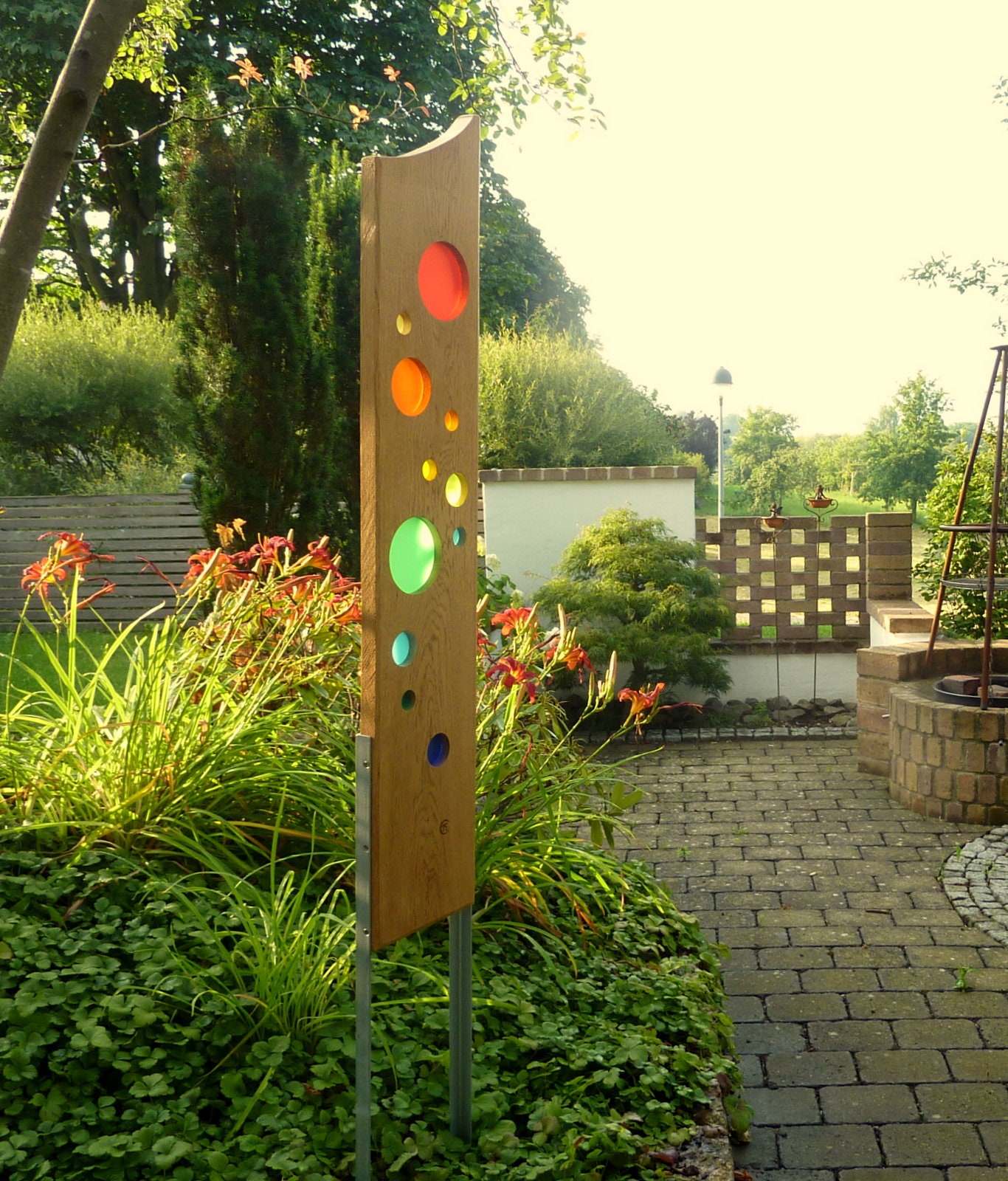 Garden Sculpture Made of Wood and Glass. Garden Decoration Garden Sculpture Made of Wood and Glass. Garden Decoration