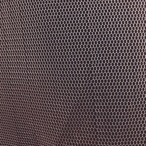 May include: Close-up of a white mesh fabric with a hexagonal pattern. The fabric is slightly translucent and has a soft, delicate texture.