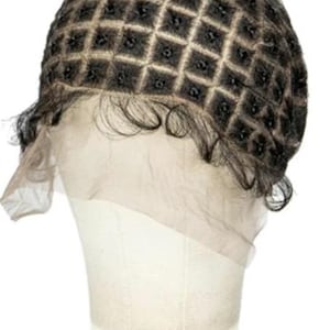 May include: A dark brown wig cap with a grid-like pattern, designed for wig construction. The cap is mounted on a white mannequin head, showcasing the lace front and the fine mesh construction.