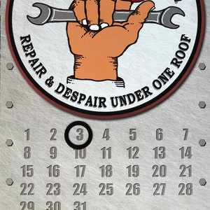 The Busted Knuckle Calendar Vintage Replica Tin Sign