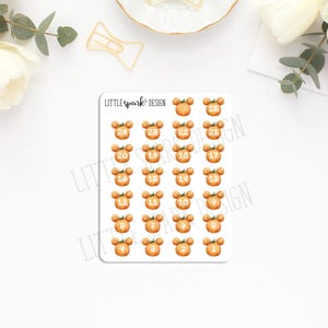 May include: A sheet of stickers featuring watercolor pumpkins with numbers 1-25. Each pumpkin is orange with a green stem. The stickers are arranged in a grid pattern. The text "LITTLE Spark DESIGN" is printed at the top.