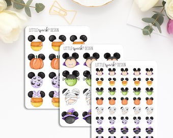 May include: Three sheets of Halloween themed stickers featuring Mickey Mouse ears with various Halloween characters and designs. The stickers include a pumpkin, candy corn, a mummy, a witch, a vampire, a Frankenstein monster, and a bat. The stickers are printed on white paper with the text "Little Spark Design" on each sheet.