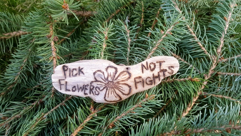 Pick Flowers Not Fights magnet