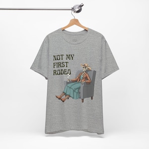 Not My First Rodeo Skeleton T-Shirt | Western rodeo humor | Funny Skeleton Tee for Her | Western Cowgirl T-Shirt by tealswan.com