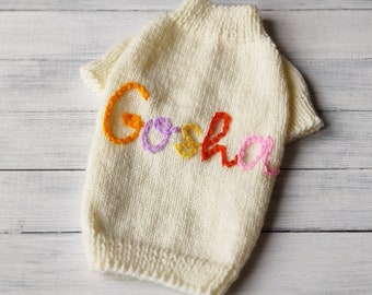 Personalized dog sweater with embroidered dog name