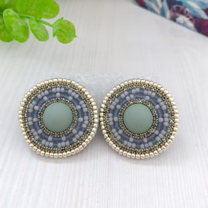 Gray silver beadwork earrings Stud Native style Round earrings with matt cabochon Seed beads boho jewelry Statement earrings