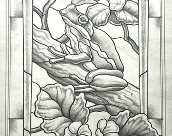 May include: A black and white pencil drawing of a frog sitting on a branch with flowers and leaves. The drawing is framed by a decorative border.
