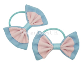 Adorable Baby Blue and Baby Pink Fabric Hair Bows on Thin bobbles for Her Delightful Look!