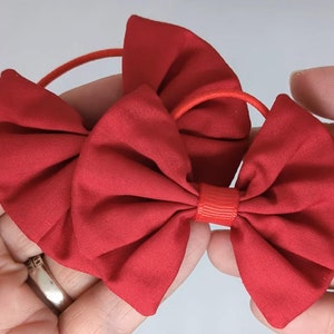 Elevate Her Style with Classic Red Fabric Hair Bows on Thin bobbles image 2