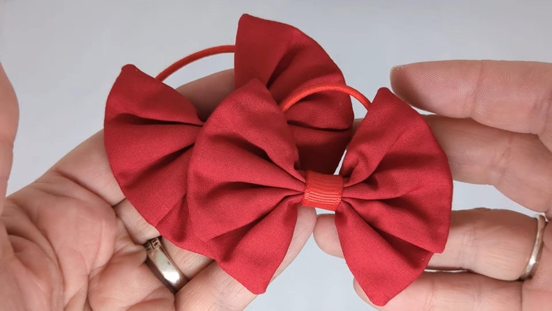 Elevate Her Style with Classic Red Fabric Hair Bows on Thin bobbles image 2