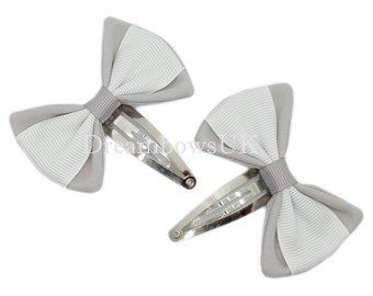 Complete Her School Ensemble with Silver and White School Bows on Snap Clips!