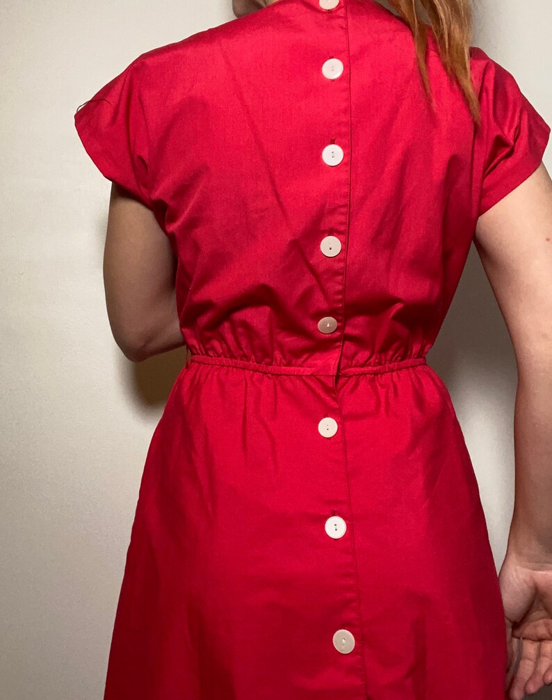 1970\u2019s Does 1950\u2019s Pink Criss Cross Dress