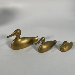 3 Brass Ducks
