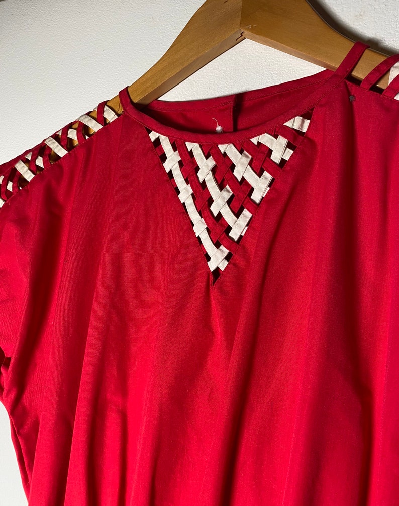1970\u2019s Does 1950\u2019s Pink Criss Cross Dress