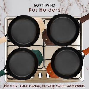 May include: A set of three ceramic mugs with a speckled, cream-colored glaze. Each mug features a different hand-painted floral design in shades of blue, green, and yellow. The mugs have a simple, rounded shape and a comfortable handle.