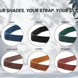 May include: Six circular cutouts display leather straps in navy, black, emerald, chocolate, copper, and red maple colors. Each strap features embossed initials. The text "YOUR SHADES. YOUR STRAP. YOUR COLOR." is centered at the top of the image.