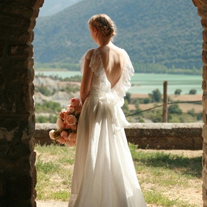 Backless linen wedding dress, lace detail dress with a train