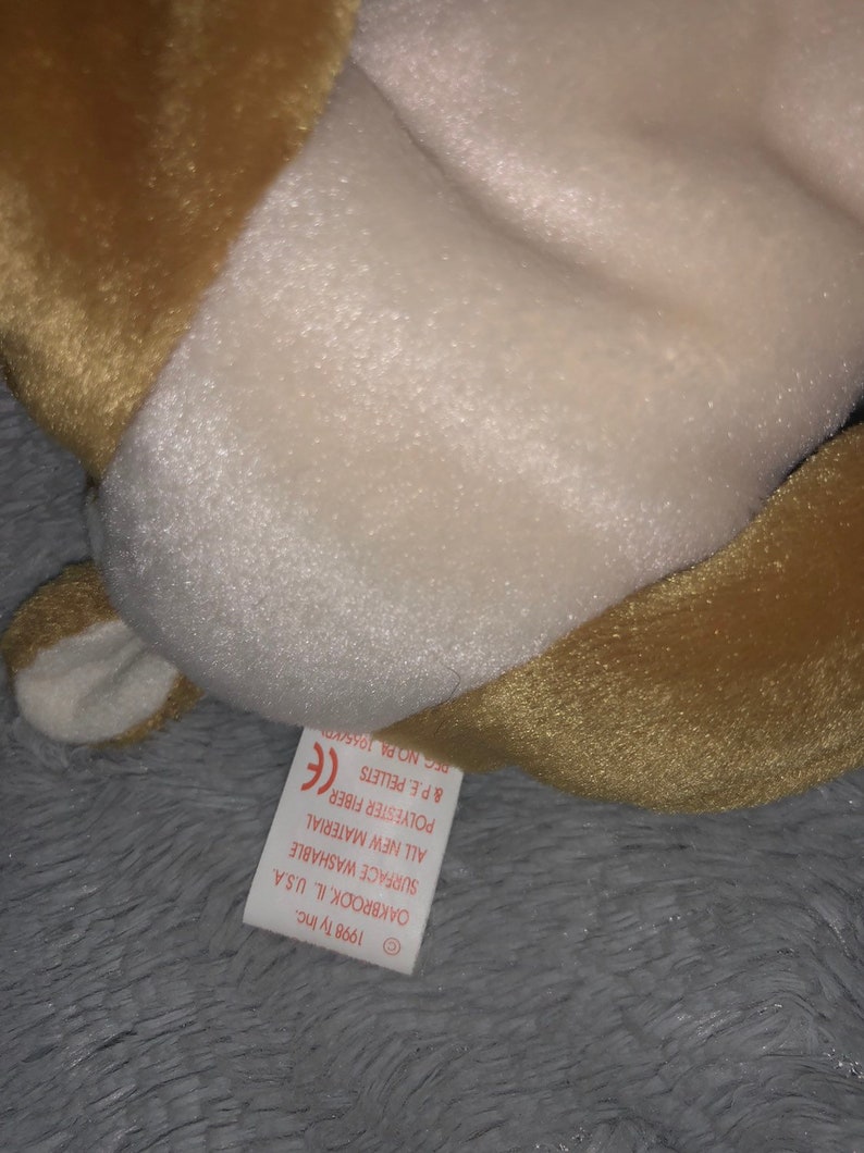 next to 1965 P.E Ty Original Whisper Beanie Baby with errors 6th gen Korean Pellets KR