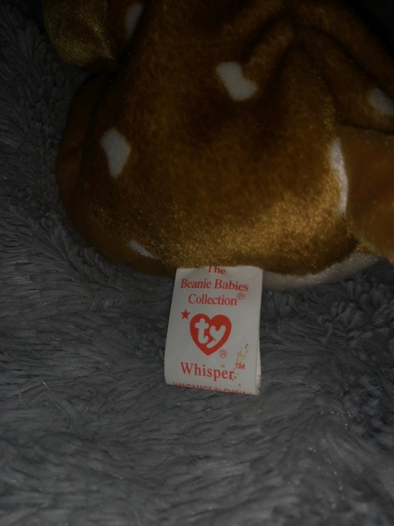 next to 1965 P.E Ty Original Whisper Beanie Baby with errors 6th gen Korean Pellets KR