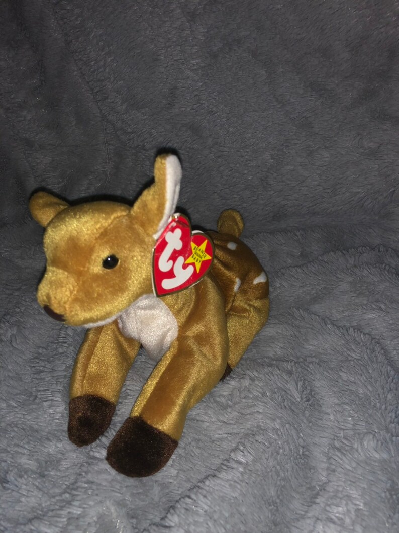 next to 1965 P.E Ty Original Whisper Beanie Baby with errors 6th gen Korean Pellets KR