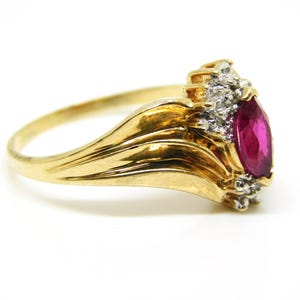 10K Yellow Gold Ring With Marquise Cut Ruby and Accent Diamonds Size 8. ...