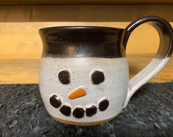 Snowman pottery coffee mug