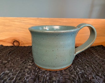 Turquoise pottery coffee mug