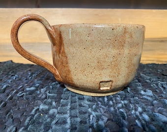 Light rust rounded pottery coffee mug