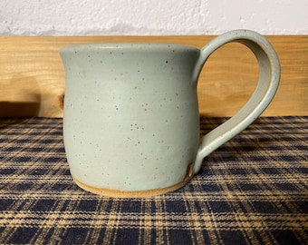 Icy turquoise pottery mug