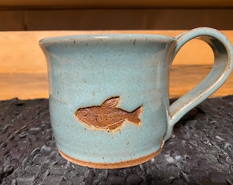 Turquoise pottery fish stamp pottery mug