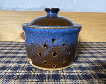 Floating blue  pottery garlic keeper