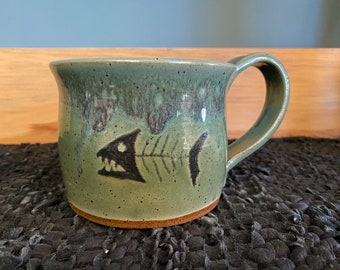 Spring green fish skeleton mug