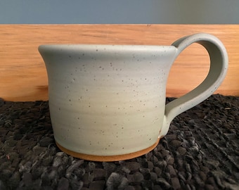 Icy turquoise pottery mug
