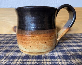 Light rust and black pottery coffee mug