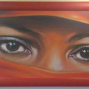 Hermosa mujer árabe con velo rojo