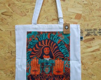 May include: White tote bag featuring a colourful graphic print of Jesus with outstretched hands. The graphic includes the text "For God so loved the world that he gave his one and only Son, that whoever believes in him shall not perish but have eternal life."