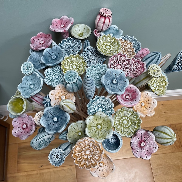 ceramic seed pod/flower garden stakes